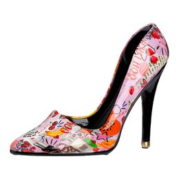 Colorful floral high heel shoe bottle holder, vibrant pink multicolor design with flowers and patterns.