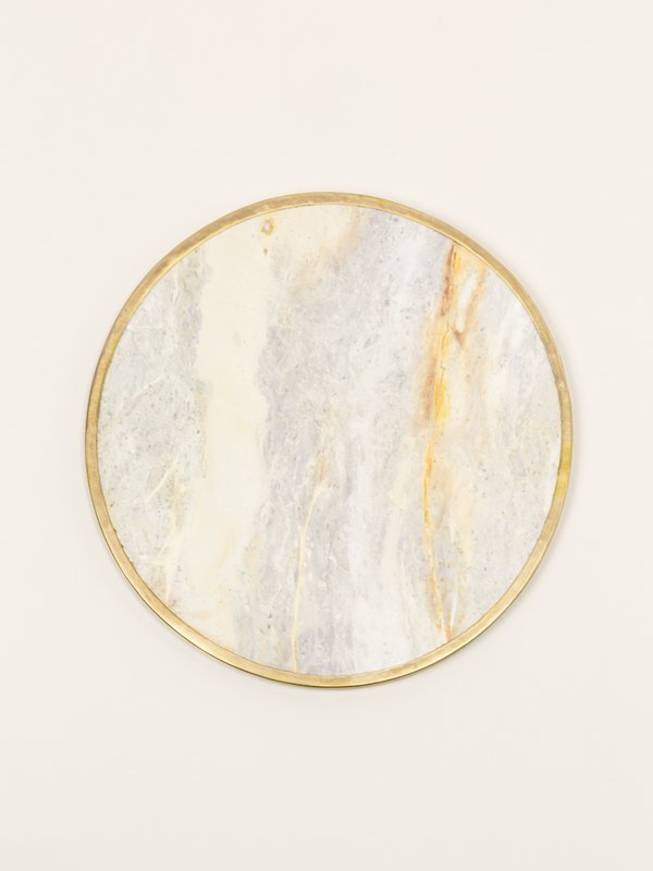 Natural stone round tablemat with brass edges
