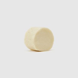  Solid shampoo bar for sensitive scalp, made with natural ingredients. Gentle cleansing, moisturizing formula.