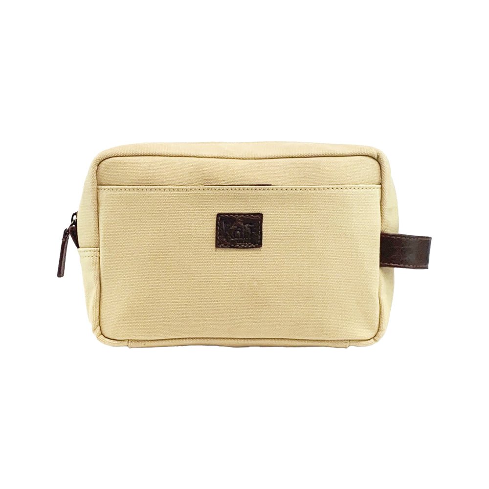 K0014GB | Beauty Case en Lona/Cuero plena flor genuino, volante de inercia. Color Cuerda/Testa Moro. Asa lateral. Cierre con cremallera. Dimensiones: 24 x 15 x 9 cm Embalaje: Bolsa Tnt