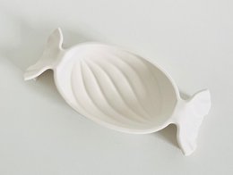 Hand cast candy bowl made of jesmonite material, designed as a serving tray for candies or other small items.