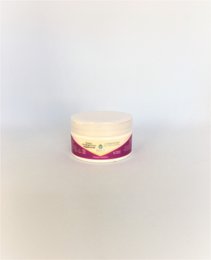 Organic detangling and care hair mask in 100g jar with pink and yellow color scheme.