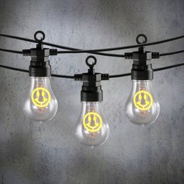  Yellow plastic string lights with round bulbs.