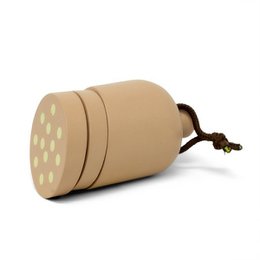  Wooden toy liverwurst sausage with red and white patterned slices.