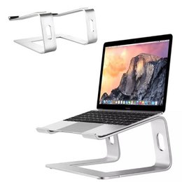 Universal light aluminum stand in silver color, suitable for laptops and MacBooks. Adjustable height and angle for comfortable use.