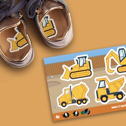 Construction site-themed shoe stickers featuring yellow construction vehicles like trucks and excavators. Suitable for kids' shoes.