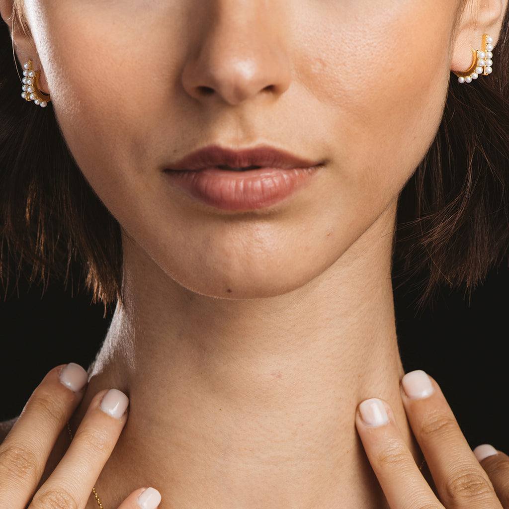 Creole silver and gold earrings with pearls