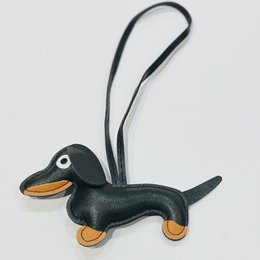  Synthetic leather dachshund keychain available in multiple colors including white, blue, camel, fuchsia, yellow, brown, black, orange, pink, and red.