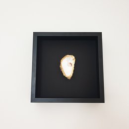 Framed golden oyster shell in black background, a decorative painting for home or office.
