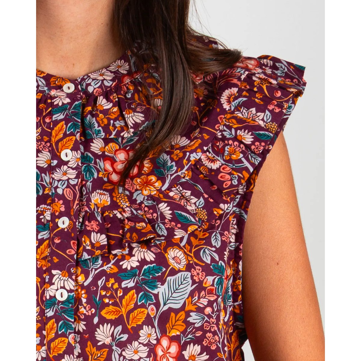 Blusa de mujer morris sin mangas con volantes