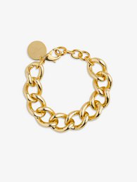 Chunky gold-tone chain bracelet with a circular charm. Crafted from high-quality metal for a durable and stylish accessory.