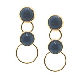 'Elegant gold-plated earrings with linked circles and various gemstones including mother of pearl, green quartz, blue sky agate, smoked obsidian, rose howlita, sodalite, white howlita, and yellow howlita.'
The product is a pair of drop earrings with a linked circle design in 18K gold plating. The earrings feature a variety of gemstones including mother of pearl, green quartz, blue sky agate, smoked obsidian, rose howlita, sodalite, white howlita, and yellow howlita. The earrings have a sophisticated and stylish appearance, making them suitable for both casual and formal wear.