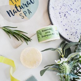 Rosemary lime shampoo bar with natural ingredients, available in paper wrap or naked variants.
