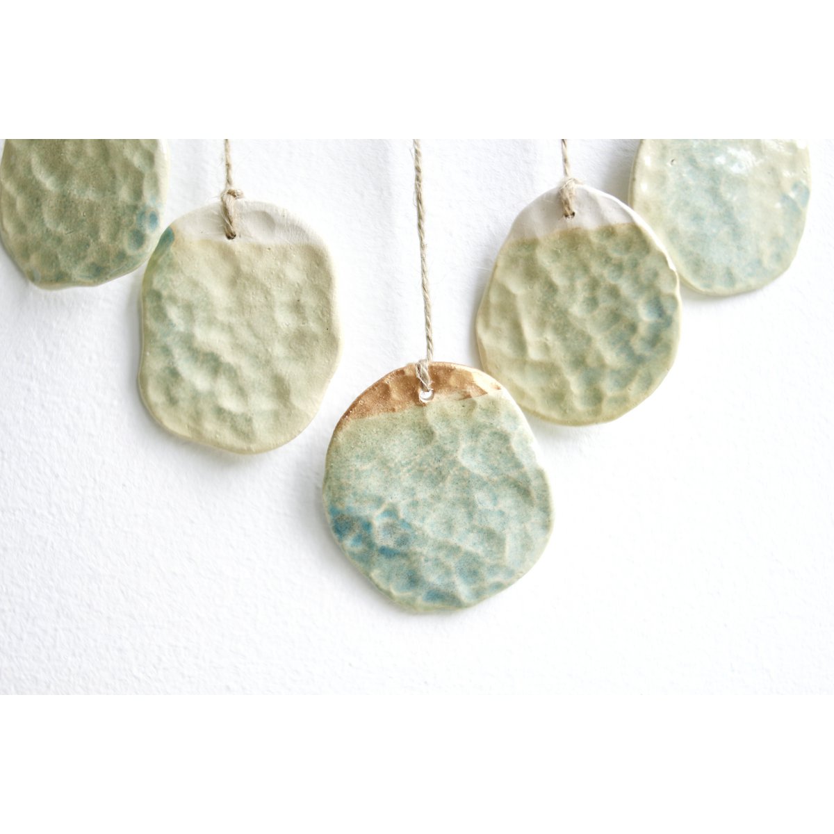 Bohemian wall hanger made of ceramic