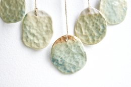Bohemian wall hanger made of ceramic