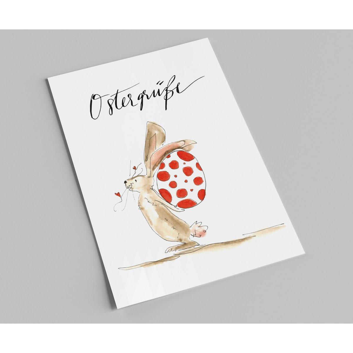 Carte postale | Carte de Pâques | Lapin avec un œuf dans le dos