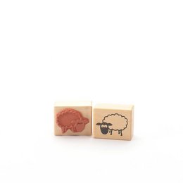Rubber stamp with sheep design, suitable for crafting and scrapbooking projects.