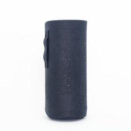 A sleek, black travel bottle with a simple, minimalist design. The bottle is made of a durable material and features a screw-top lid for easy use.