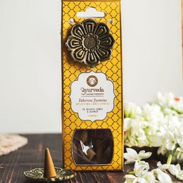 Ayurveda incense cones with a metal hanging burner, featuring a tuberose jasmine (Vata) scent, packaged in a box with a floral design.