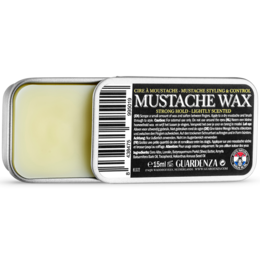 A tin of mustache wax with a black and yellow label. The wax is used for grooming and styling mustaches.