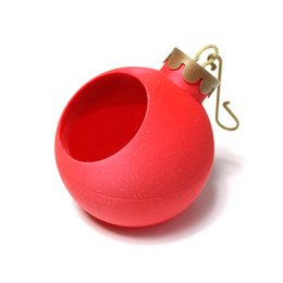  A round, red Christmas bauble with a gold cap and hook. The bauble appears to be fillable, with a small opening visible.