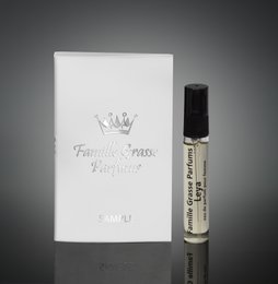 Floral, feminine eau de parfum for women in a 5ml size. Packaged in a white box with a crown logo.