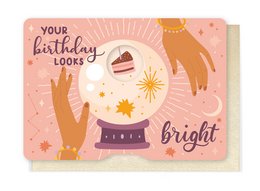 A colorful birthday card with a cake, candles, and silhouettes of hands and a cat. The text reads "Your birthday looks bright."