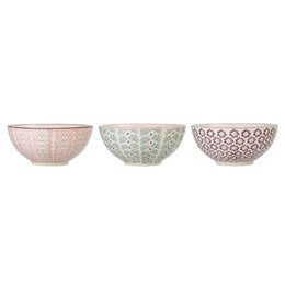 Purple stoneware bowl with a textured, dotted pattern. Durable and suitable for everyday use in the kitchen or on the dining table.