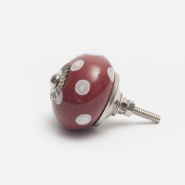Blauwe keramische knop met witte stippen