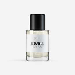 Eau de parfum with notes of citrus, spice, and floral scents. Elegant glass bottle with black cap.