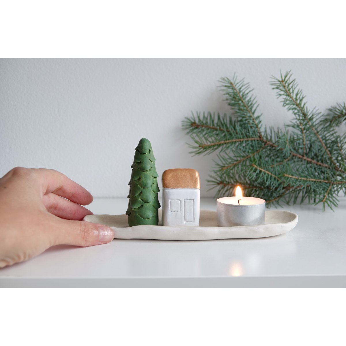 Christmas Giftbox with house, tree and candle