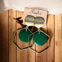 "Green hexagon statement earrings, geometric shape, emerald color, bold modern design"