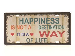 Vintage-style wall plaque with the text "Happiness is not a destination, it is a way of life" in a rustic, distressed design.