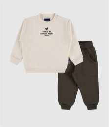 Cream beige sweatshirt with cat graphic, black jogger pants, kids loungewear set.