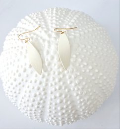oorbellen - Twist - groen/lila/roze/blauw/ivoor/vos/geel