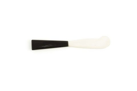 Butter knife with black horn handle and bone blade