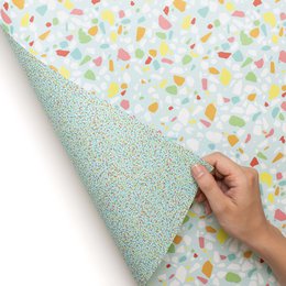 Colorful wrapping paper turquoise with terrazzo pattern, children pack gifts for children's birthday, for school or at birth