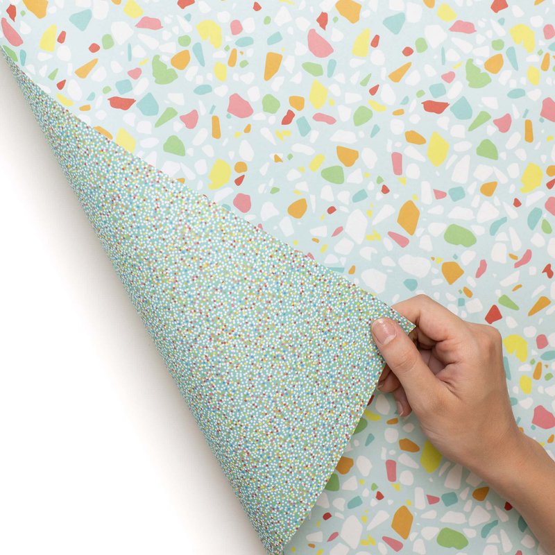 Colorful wrapping paper turquoise with terrazzo pattern, children pack gifts for children's birthday, for school or at birth
