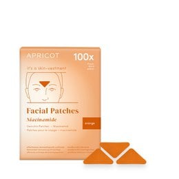 Apricot-colored facial patches containing niacinamide, a skincare ingredient that helps reduce the appearance of blemishes and even skin tone.