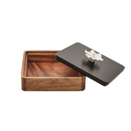 Rectangular wooden box with a black lid and a star-shaped metal accent on the lid. The box is made of warm-toned wood and appears to be a decorative storage or display piece.