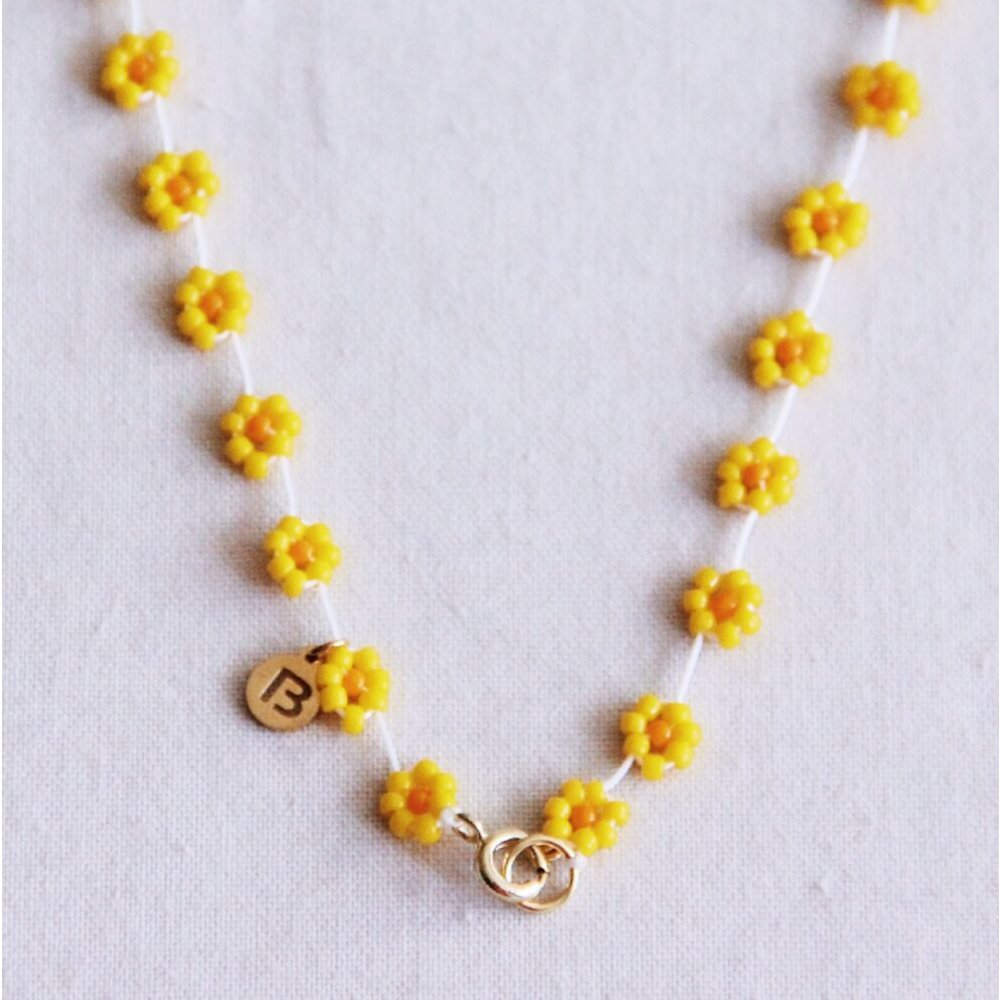 Daisy bloem ketting - geel/oranje