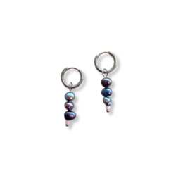 Silver earrings with three black pearls of varying sizes.