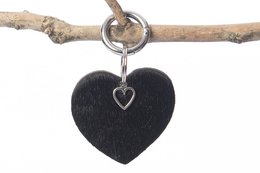 Black heart-shaped bag hanger with a charm, suitable for keychains.
