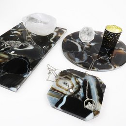 Black agate tray, octagon trivet, and circle tray made of natural agate stone with unique patterns and colors. Suitable for serving, decorative, and home organization purposes.