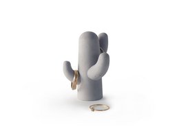 Concrete jewelry holder in the shape of a cactus. Made of durable concrete material, this unique jewelry stand can hold various types of jewelry. Features a minimalist and modern design.