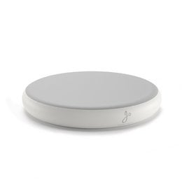 A round, white sensory toy with a smooth, minimalist design. Suitable for indoor and outdoor use as a calming, interactive toy.
