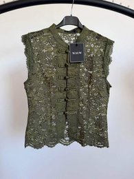 Olive green lace sleeveless tank top, delicate floral pattern, lightweight summer vest.