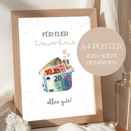 Colorful heart-shaped posters for money gifts, featuring the text "Alles Liebe" (All the Best). The posters are displayed in a wooden frame and appear to be made of paper or fabric.