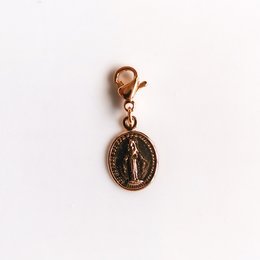 Oval-shaped bronze pendant with a religious image, suitable for wearing as a necklace or charm.