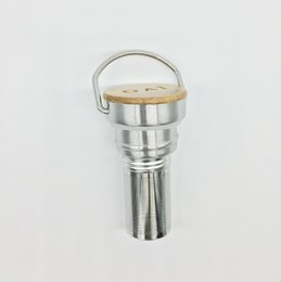 Stainless steel infuser cap with wooden "Infuser" text. Designed for use with shower gels or other liquids.